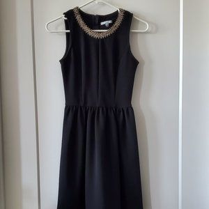 black mini dress with beaded neckline from soprano